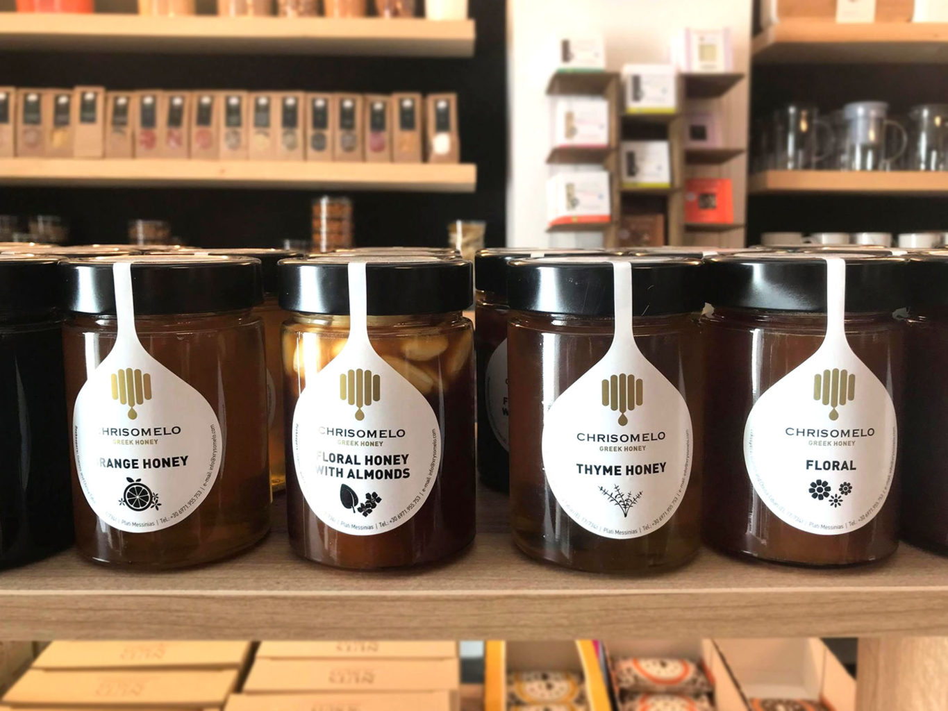 Chrisomelo honey packaging on wooden surface
